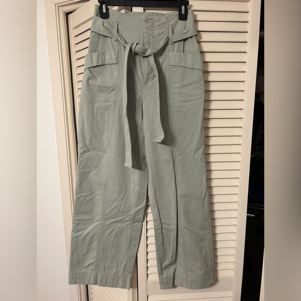 A new day light green pants, size 2